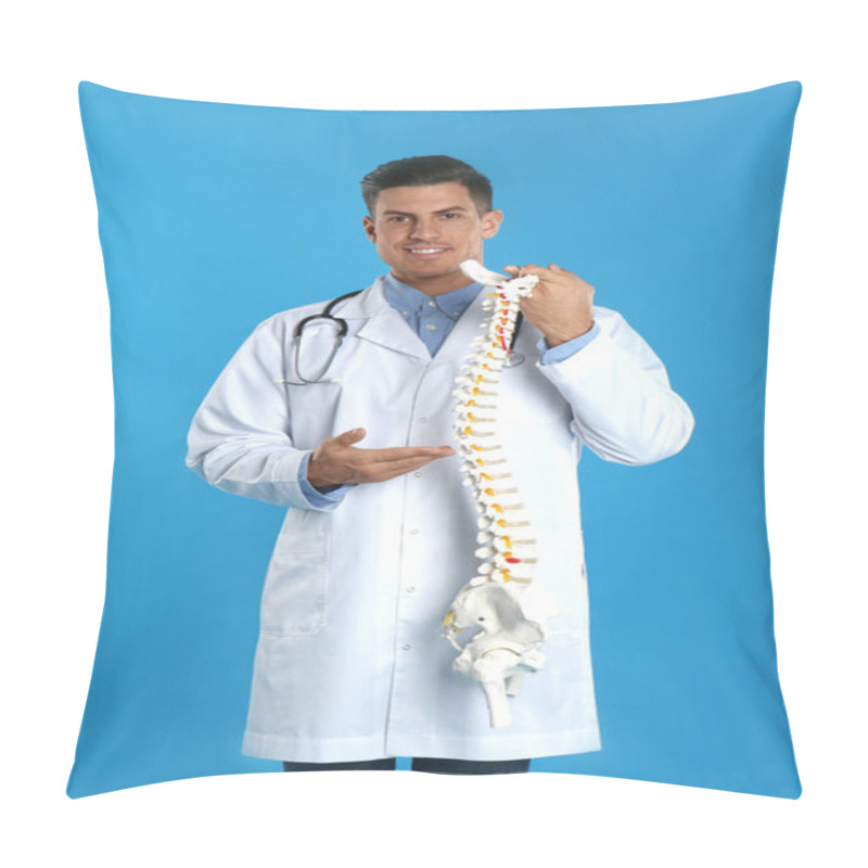 Personality  Male Orthopedist With Human Spine Model Against Blue Background Pillow Covers