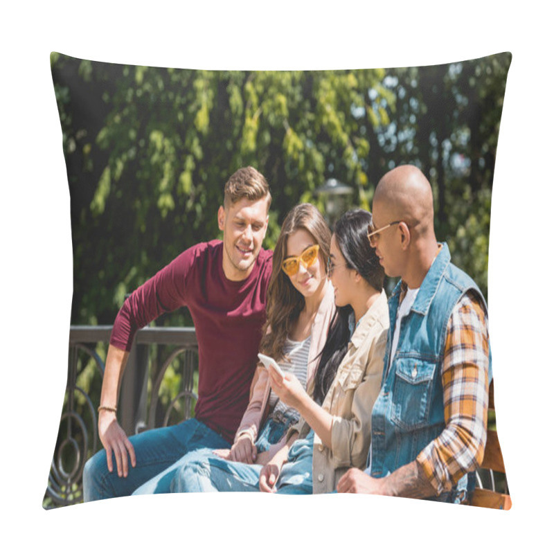 Personality  Cheerful Multicultural Friends Sitting On Bench And Looking At Girl Holding Smartphone Pillow Covers