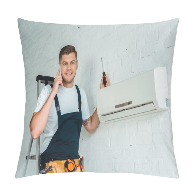 Personality  Happy Installer Holding Screwdriver While Talking On Smartphone Near Air Conditioner  Pillow Covers