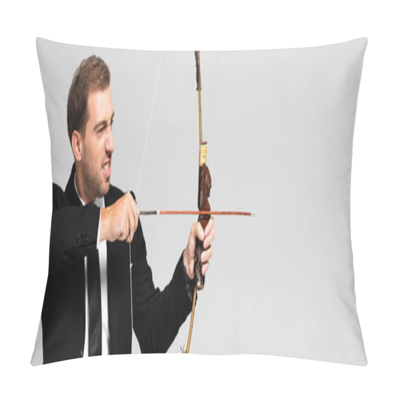 Personality  Panoramic Shot Of Angry Businessman In Suit Holding Bow And Shooting With Arrow Isolated On Grey Pillow Covers