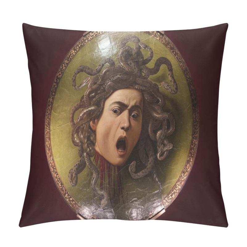 Personality  Florence, Italy - May 23, 2023: Famous Painting Masterpiece Of Medusas Head With Snakes Hair, Mouth Agape In Terror, Displayed On A Round Shield By Baroque Painter Caravaggio In Uffizi Gallery, Italy. Pillow Covers