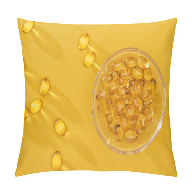 Personality  Top View Of Golden Shiny Fish Oil Capsules Scattered Near Glass Bowl On Yellow Bright Background Pillow Covers