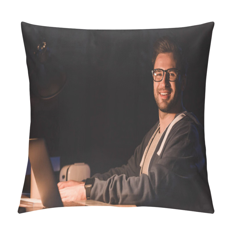 Personality  Handsome Young Programmer In Eyeglasses Smiling At Camera While Working With Laptop And Desktop Computer At Night Time Pillow Covers