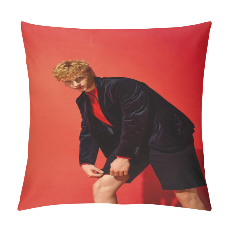 Personality  A Stylish Man Showcases Unique Holiday Fashion In A Vibrant Red Setting. He Combines A Dark Blazer With Shorts, Radiating Confidence And Creativity For Christmas 2025 Celebrations. Pillow Covers