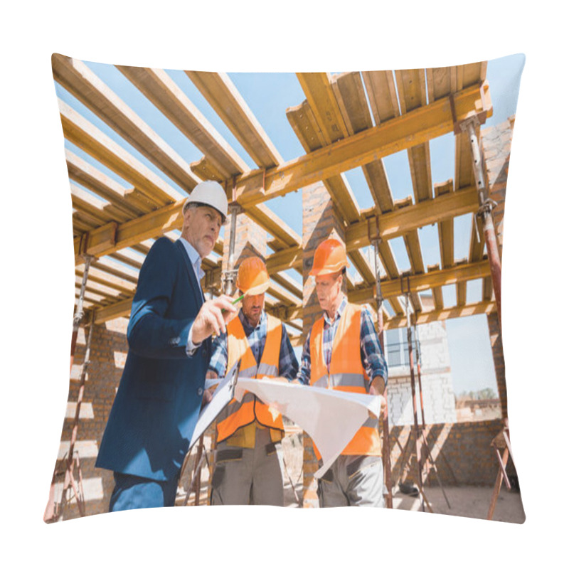 Personality  Mature Businessman Near Builders In Helmets Holding Blueprint Pillow Covers