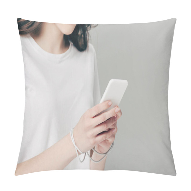 Personality  Cropped View Of Young Woman In White T-shirt And Usb Cable Around Hands Using Smartphone Isolated On Grey Pillow Covers