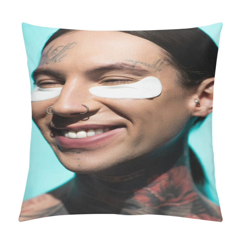 Personality  Close Up Of Tattooed Young Man With Eye Patches Smiling Isolated On Turquoise Pillow Covers