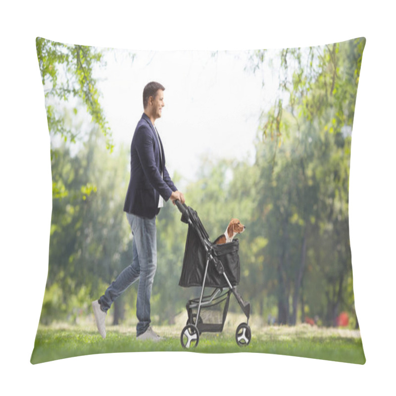 Personality  Full Length Profile Shot Of A Young Man Walking And Pushing A Dog Stroller In A Park Pillow Covers