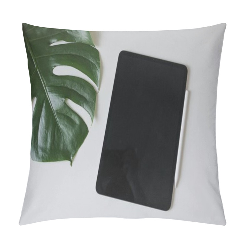 Personality  A Minimalist Workspace Featuring A Tablet, Stylus, And A Large Green Leaf. Pillow Covers