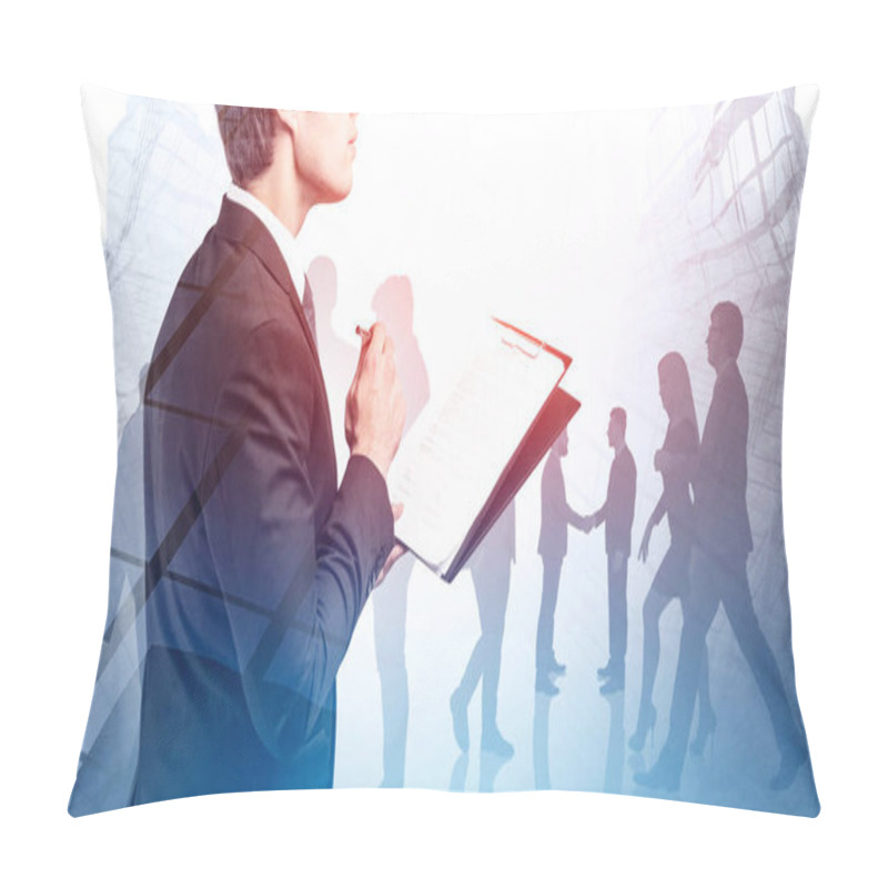 Personality  Unrecognizable Young Manager With Clipboard Standing In Abstract City With Double Exposure Of His Colleagues. Leadership And Corporate Lifestyle Concept. Toned Image Pillow Covers