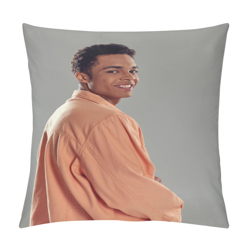 Personality  Happy Man In Peach Shirt Standing Against Grey Wall, Showcasing His Impeccable Fashion Sense Pillow Covers