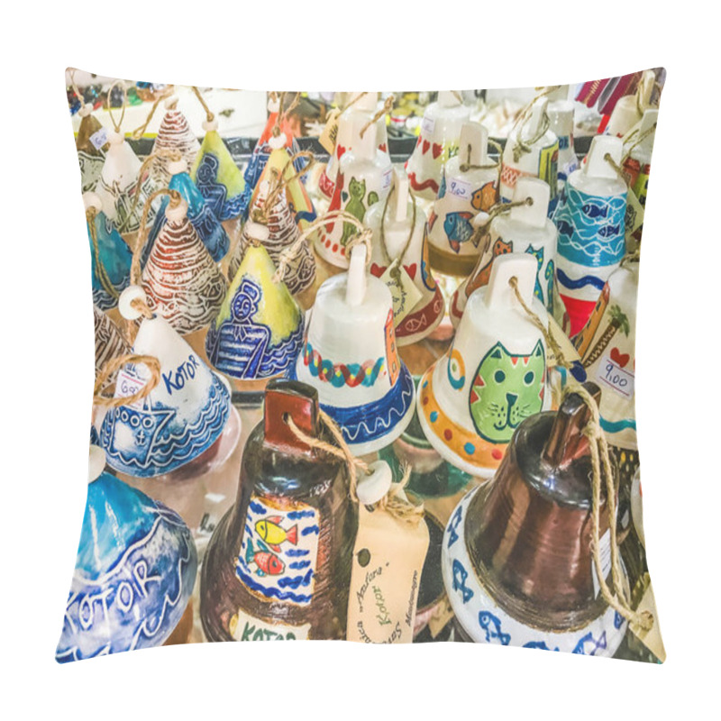 Personality  Kotor, Montenegro - August 24, 2017:  Selection Of Souvenirs From The Old Town Of Kotor, Montenegro. Souvenir Trade - Various Bells With Kotor Inscriptions And Beautiful Drawings. Pillow Covers