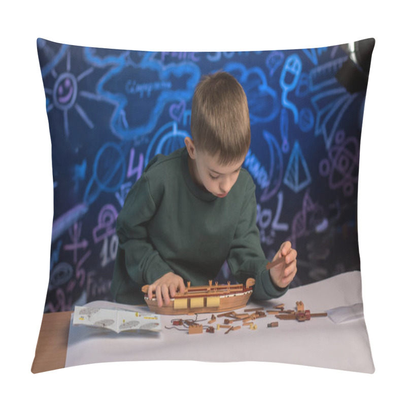 Personality  A Child In A Green Sweatshirt Building A Model Ship, Immersed In A Creative Project, Symbolizing Concentration And Practical Skills Pillow Covers