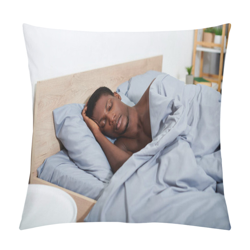 Personality  A Young African American Man Peacefully Sleeping In Bed Under A Blue Blanket, Beginning To Wake Up In The Morning. Pillow Covers