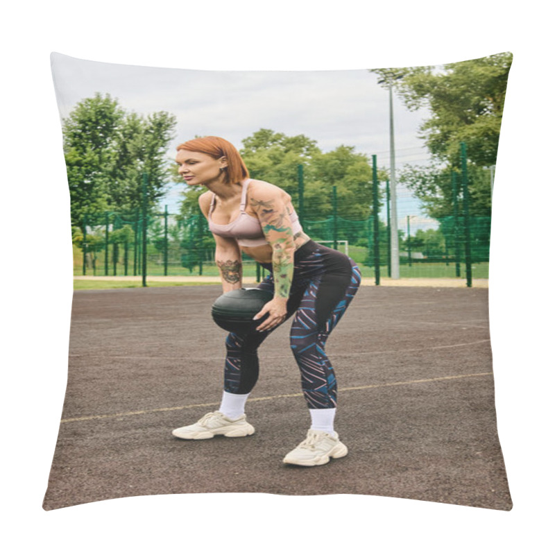 Personality  A Woman In Sportswear, Holding A Medicine Ball, Trains Outdoors With Determination And Motivation Pillow Covers