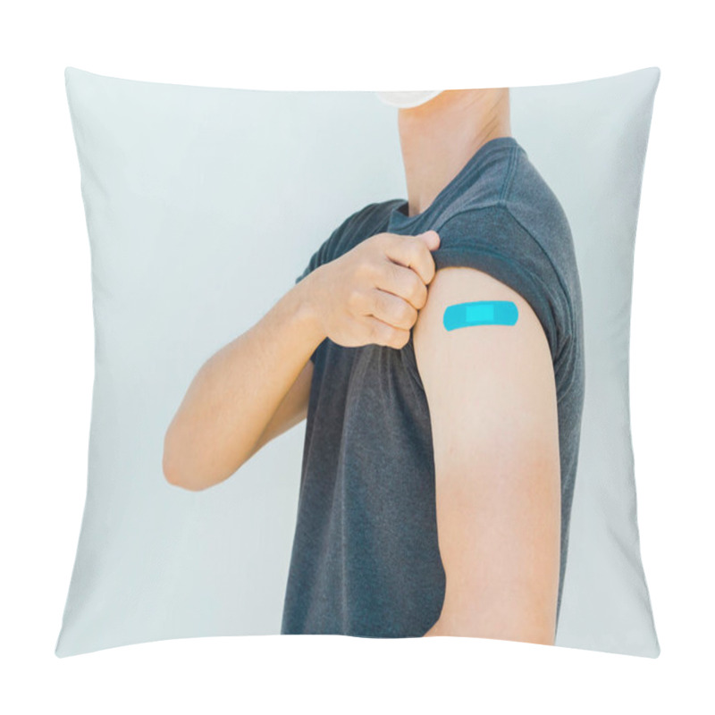 Personality  Vaccinations, Bandage On Vaccinated People Concept. Blue Bandage On Man Shoulder Who Wearing Grey Shirt After Vaccination Treatment On White Background, Showing With Strong Gesture. Pillow Covers