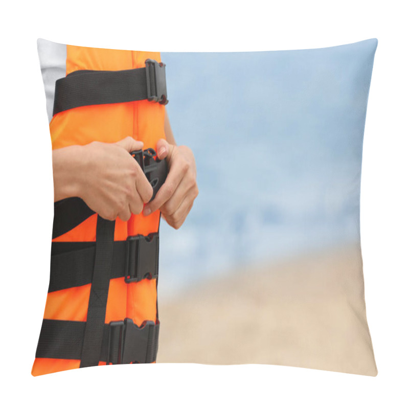 Personality  Female Lifeguard Putting On Life Vest Near Sea, Closeup Pillow Covers