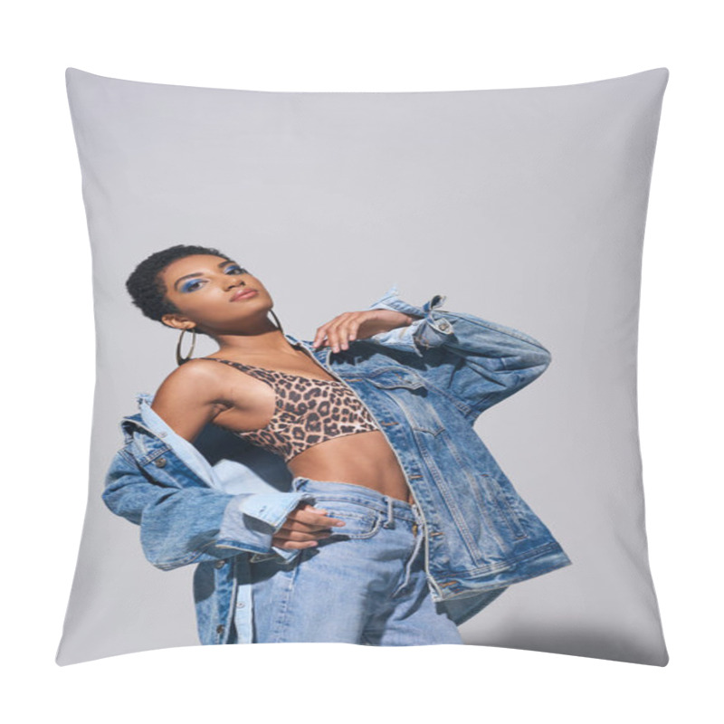 Personality  Modern African American Woman With Bold Makeup Posing In Top With Animal Print, Denim Jacket And Jeans While Standing On Grey Background, Denim Fashion Concept Pillow Covers