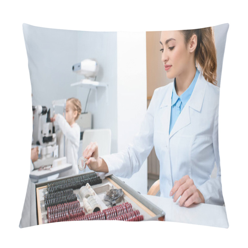 Personality  Female Optometrist With Lenses For Trial Frame While Colleague Examining Kid With Visual Field Test Pillow Covers