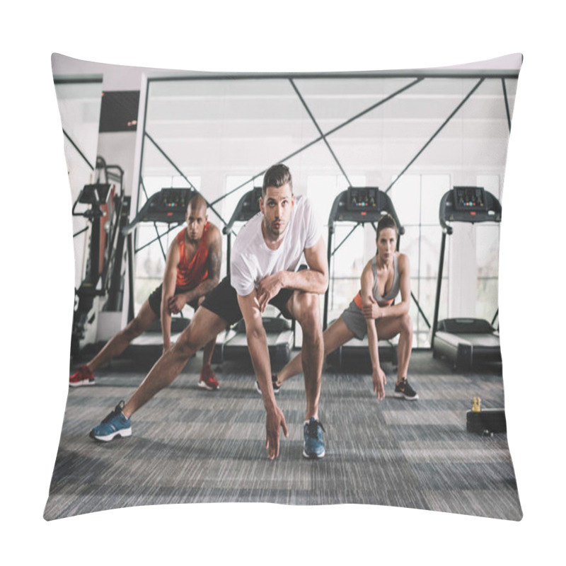 Personality  Handsome Trainer Looking At Camera While Doing Lunges Exercise Together With Multicultural Athletes Pillow Covers