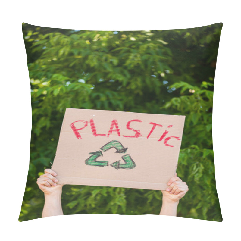 Personality  Cropped View Of Man Holding Placard With Plastic Lettering And Recycle Sign With Trees At Background, Ecology Concept  Pillow Covers