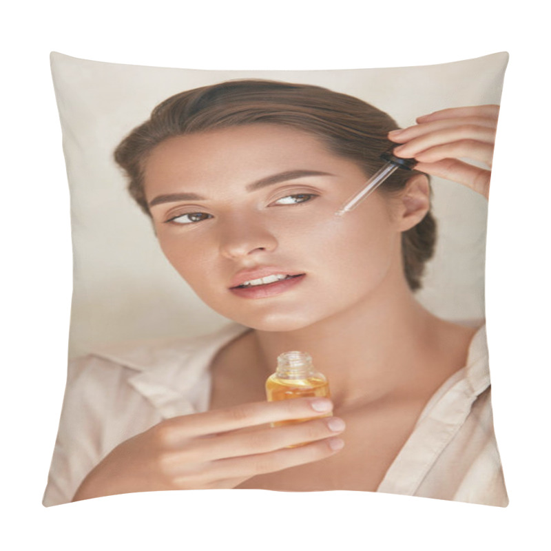 Personality  Beauty Face. Woman Applying Essential Oil On Facial Skin And Looking Away. Beautiful Model Moisturizing Derma With Natural Vitamin E, Serum Collagen And Hyaluronic Acid. Pillow Covers