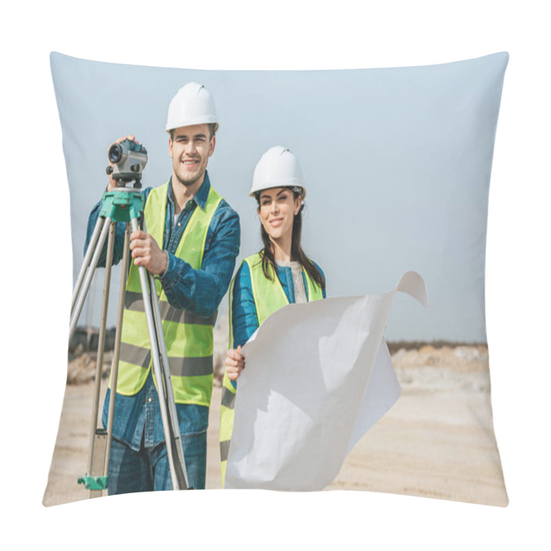 Personality  Smiling Surveyors With Digital Level And Blueprint Looking At Camera Pillow Covers