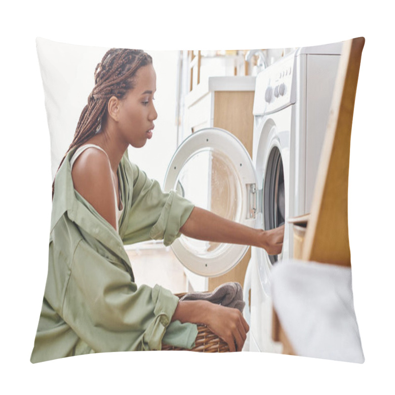 Personality  An African American Woman With Afro Braids Loads A Washer Into A Dryer While Doing Laundry In A Bathroom. Pillow Covers