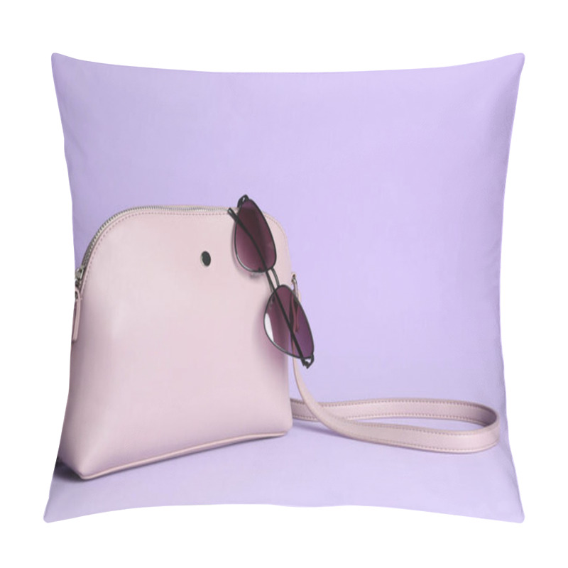 Personality  Stylish Woman's Bag And Sunglasses On Lilac Background. Space For Text Pillow Covers