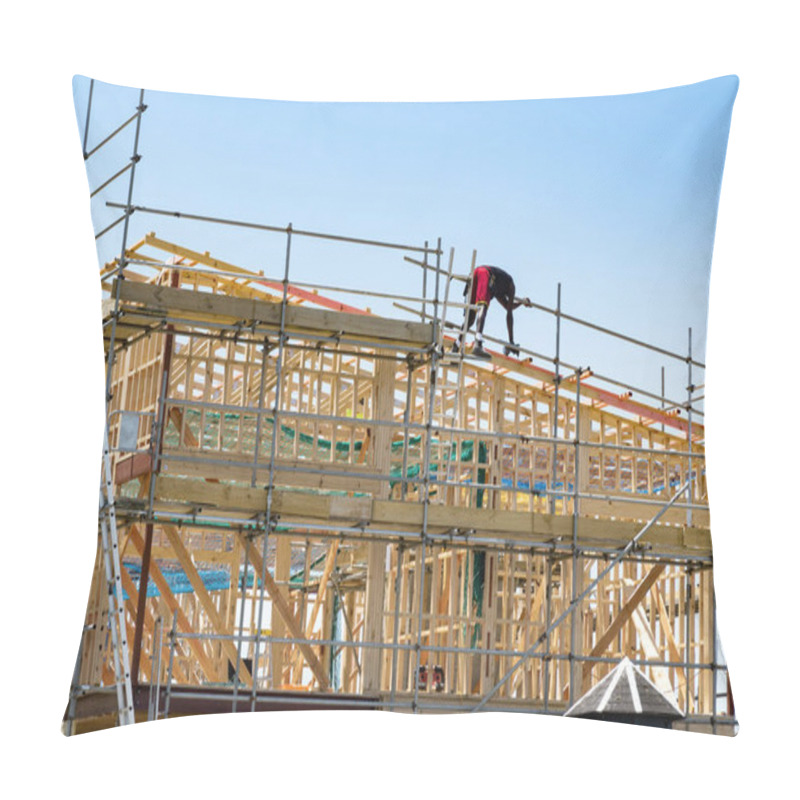 Personality  View Of New Home Construction Site With Wooden Frame And Worker On The Roof Pillow Covers