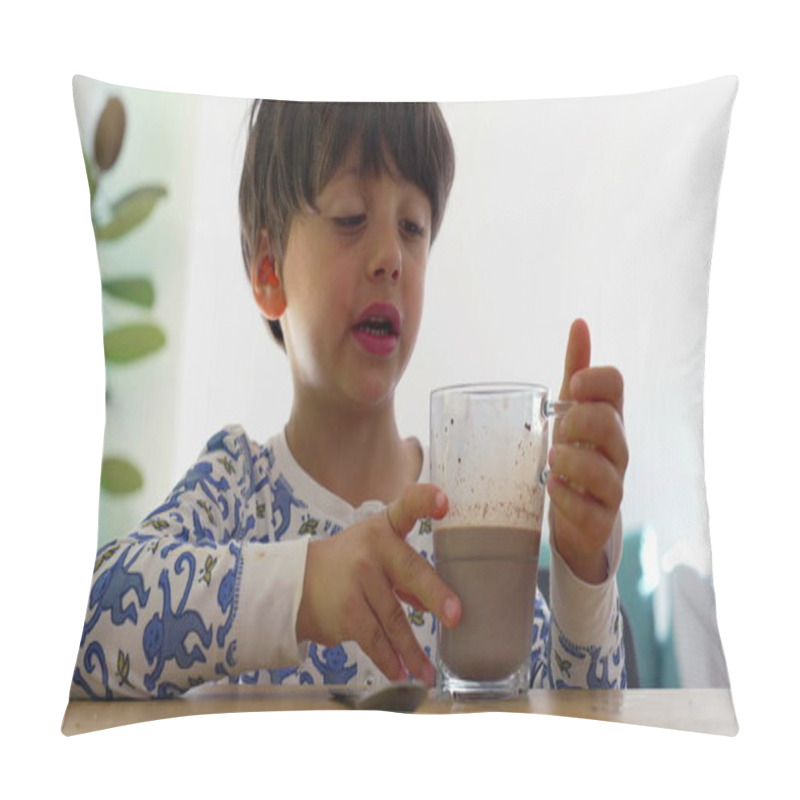 Personality  Young Boy Drinking A Glass Of Chocolate Milk At The Table, Enjoying A Quiet Moment In A Bright Home Kitchen, Wearing Pajamas With Playful Blue Patterns, Relaxed Morning Routine Pillow Covers