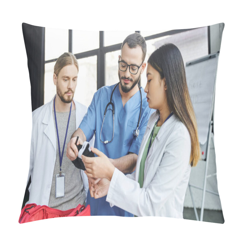 Personality  First Aid Training Seminar, Medical Instructor In Eyeglasses And Uniform Showing Compressive Tourniquet To Interracial Students In White Coats, Life-saving Skills And Bleeding Prevention Concept Pillow Covers