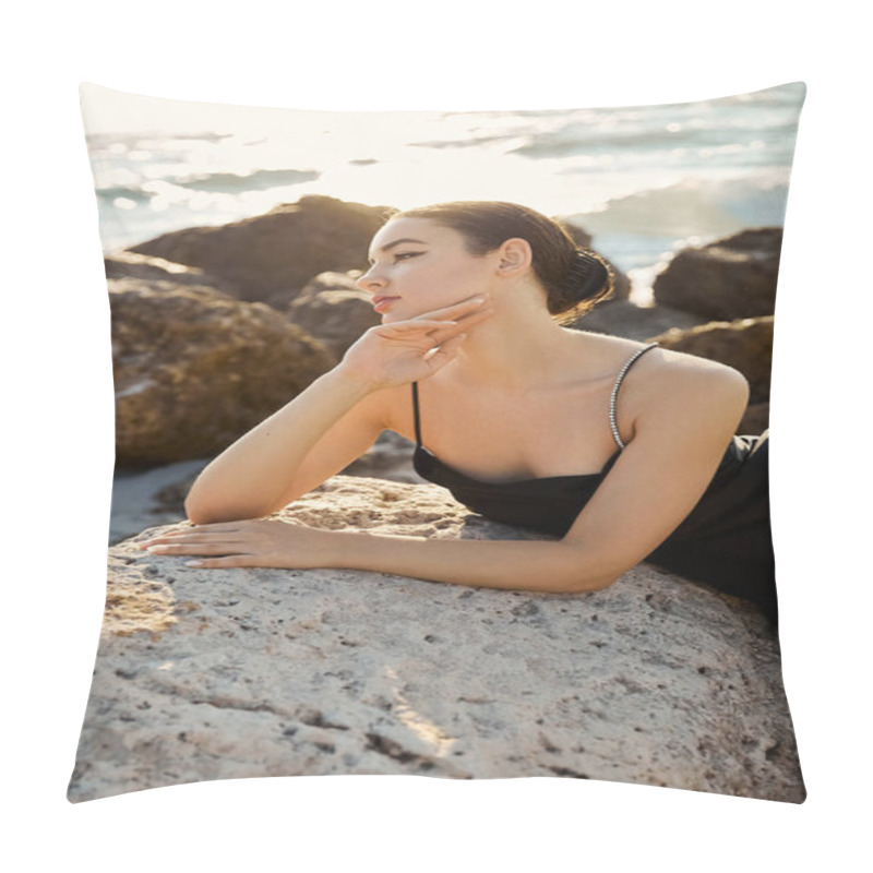 Personality  A Young Woman In A Black Sundress Rests On A Rock On Miami Beach, Gazing Out At The Ocean. Pillow Covers