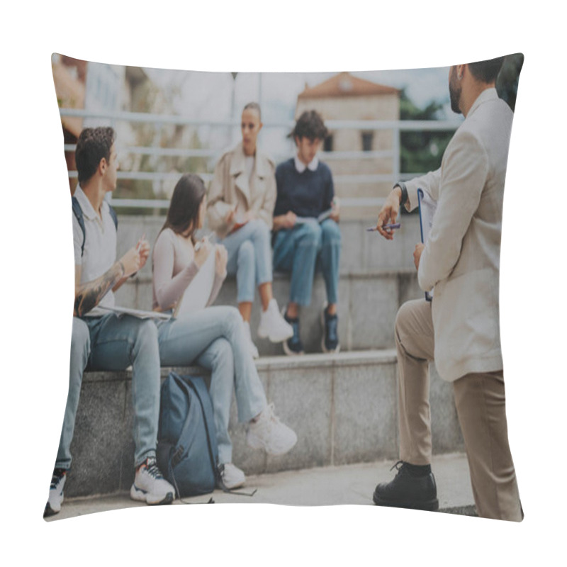 Personality  A Group Of High School Students Are Seated Outdoors, Attentively Engaging In Task-solving With The Help Of A Professor. The Setting Exudes A Collaborative And Educational Atmosphere. Pillow Covers