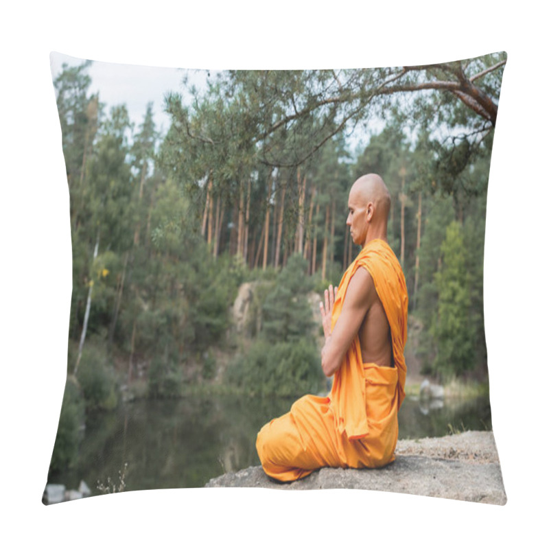 Personality  Buddhist Monk In Orange Kasaya Meditating In Lotus Pose With Praying Hands Near Forest Lake Pillow Covers