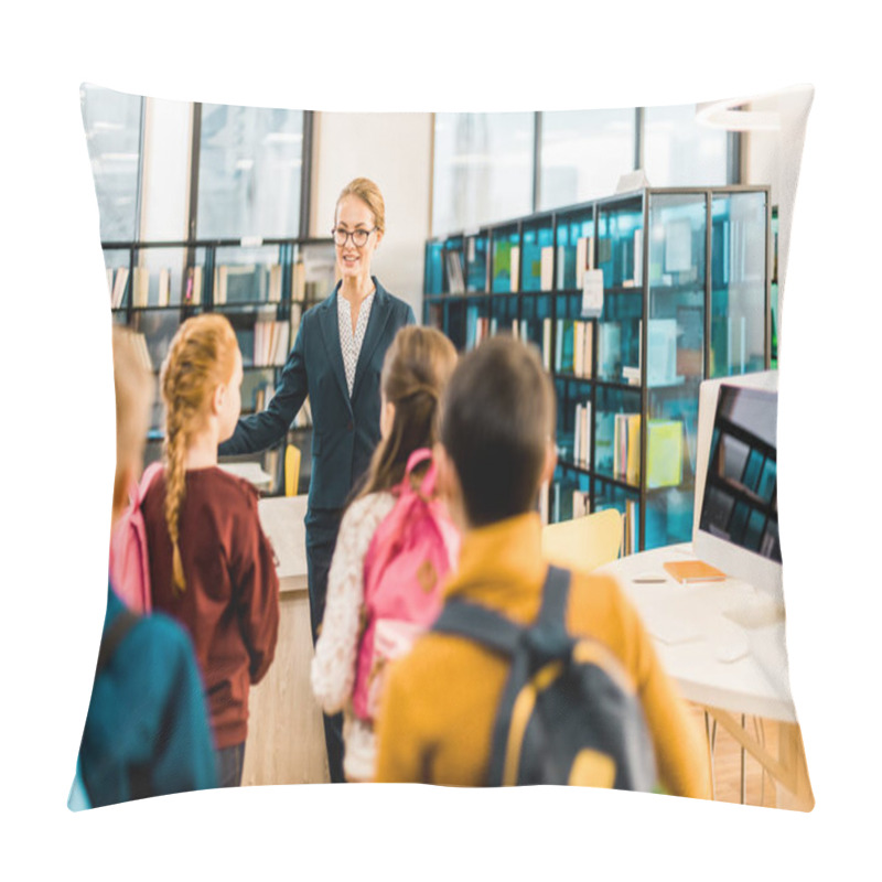 Personality  Back View Of Schoolchildren With Backpacks Looking At Female Librarian  Pillow Covers