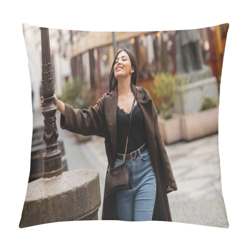 Personality  Trendy Brunette Woman In Coat Touching Lamppost And Laughing On Street In Park Pillow Covers