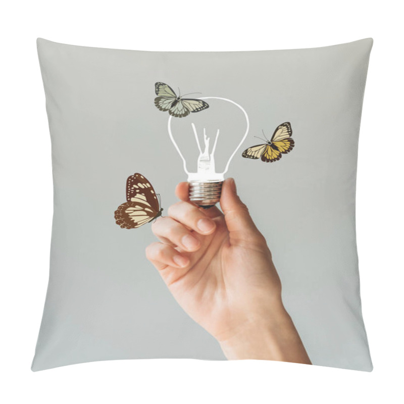 Personality  Cropped Image Of Woman Holding A Lamp With Butterflies In Her Hand Isolated On Gray Pillow Covers