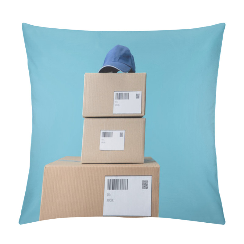 Personality  Cap On Stacked Cardboard Boxes Isolated On Blue Pillow Covers