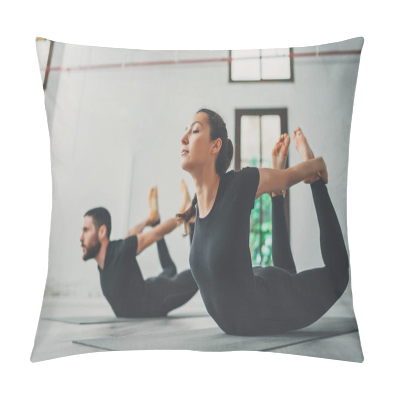 Personality  Yoga Practice Exercise Class Concept. Two Beautiful People Doing Exercises.Young Woman And Man Practicing Yoga Indoors. Pillow Covers