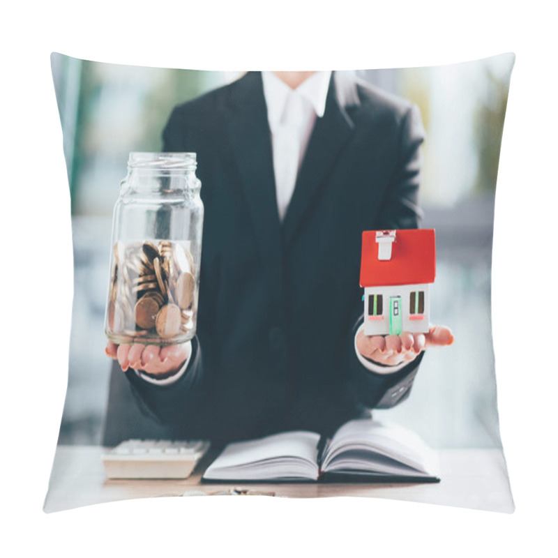 Personality  Cropped Shot Of Businesswoman Holding Glass Jar With Coins And Small House Model Pillow Covers