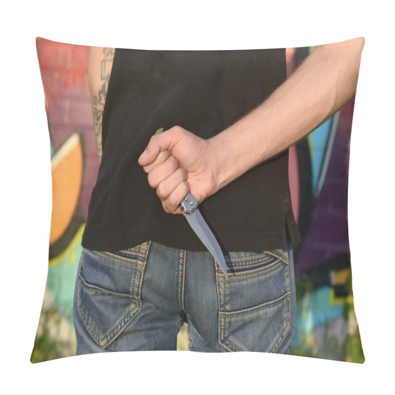 Personality  Back View Of Young Caucasian Man With Knife In His Hand Against Ghetto Brick Wall With Graffiti Paintings. Concept Of Criminal Forces And Aggression Charge. Classic Killers Melee Weapon Pillow Covers