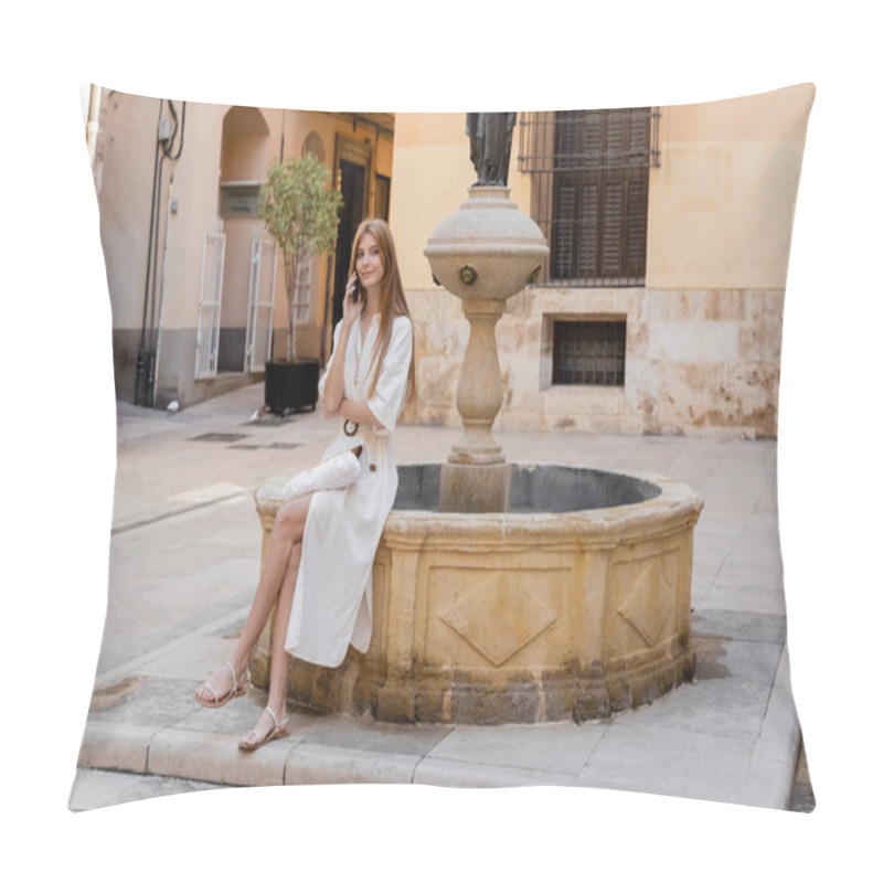 Personality  Full Length Of Cheerful Woman In White Dress Sitting And Talking On Smartphone Near Fountain In Valencia Pillow Covers