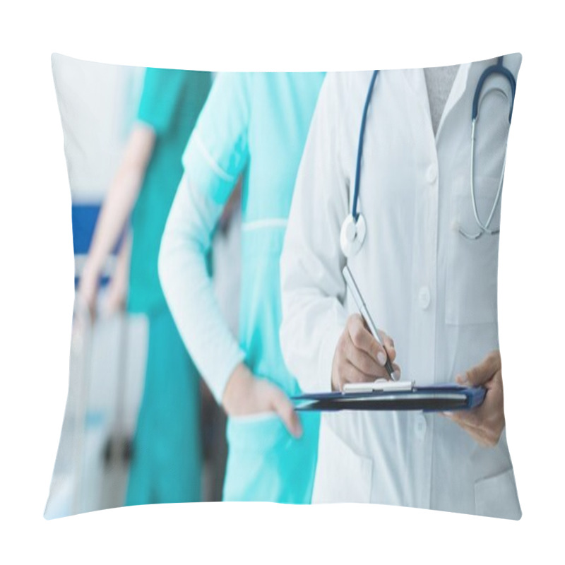 Personality  Medical Staff Working At The Hospital: Doctor And Nurse Checking A Patient's Medical Record On A Clipboard, Healthcare And Medical Exams Concept Pillow Covers