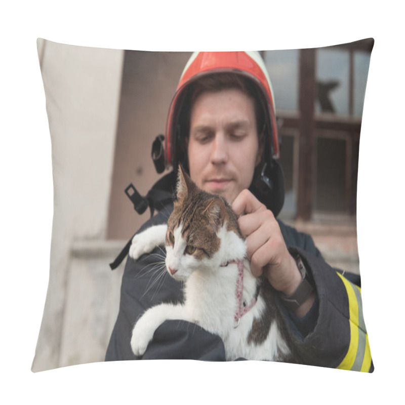 Personality  Close-up Portrait Of Heroic Fireman In Protective Suit And Red Helmet Holds Saved Cat In His Arms. Firefighter In Fire Fighting Operation. High Quality Photo Pillow Covers