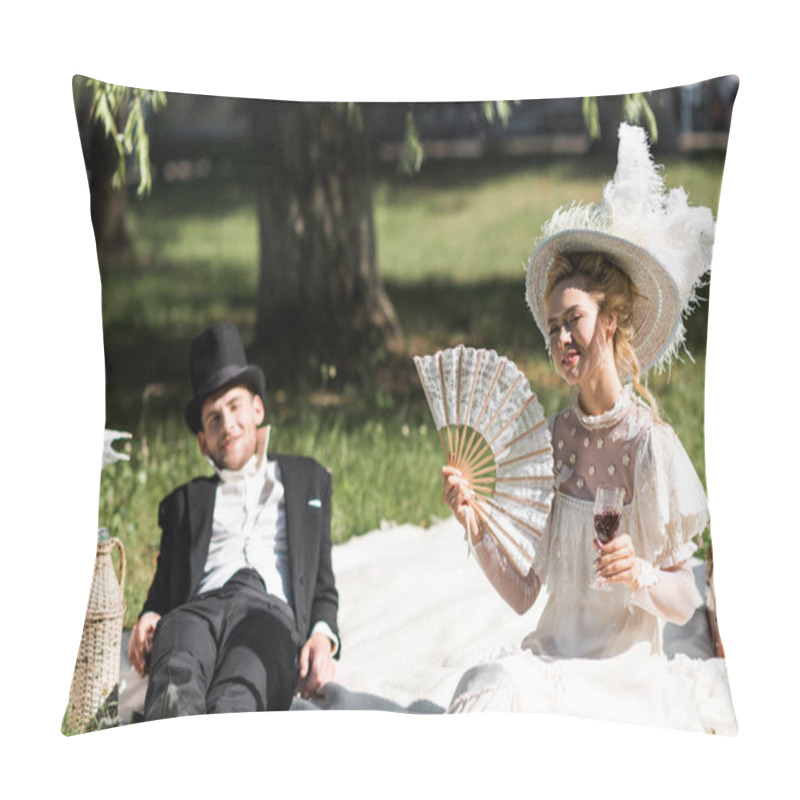 Personality  Selective Focus Of Happy Victorian Woman Siting On Blanket And Holding Wine Glass Near Man  Pillow Covers