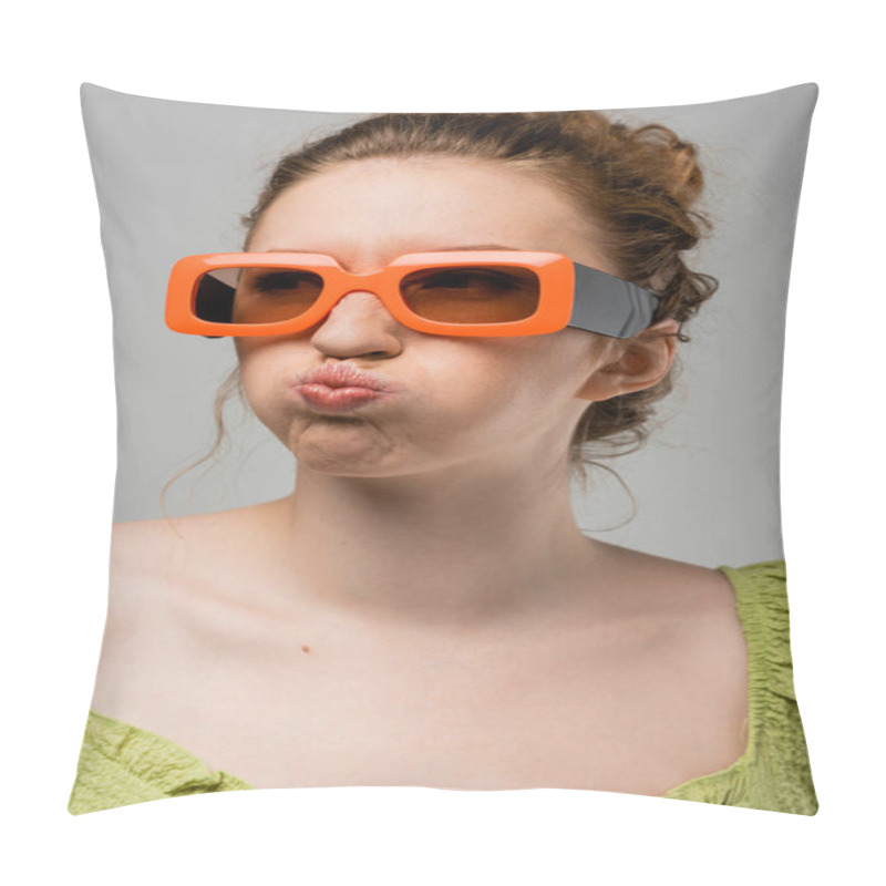 Personality  Portrait Of Young Redhead Woman In Sunglasses And Green Blouse Grimacing And Pouting Lips While Standing Isolated On Grey Background, Trendy Sun Protection Concept, Fashion Model  Pillow Covers