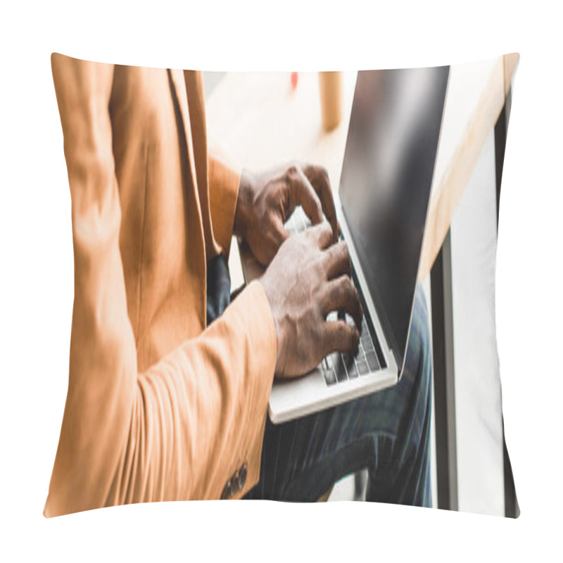 Personality  Cropped View Of African American Businessman Sitting On Desk And Using Laptop, Panoramic Shot Pillow Covers