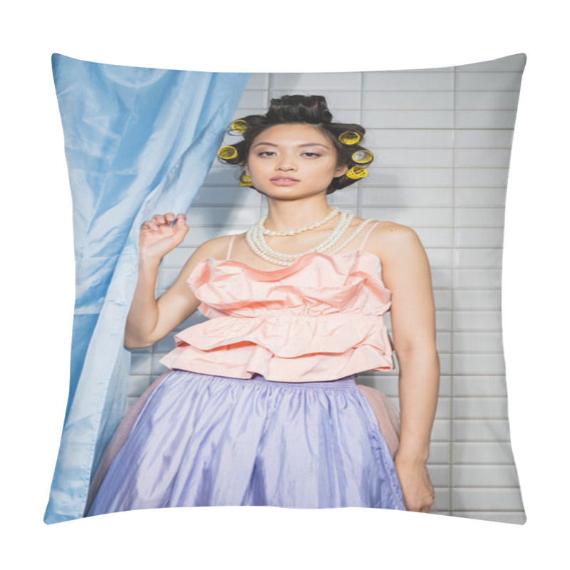 Personality  Fashionable And Asian Young Woman With Hair Curlers Standing In Pink Ruffled Top With Pearl Necklace Near Blue Bathroom Curtain And Looking At Camera Near White Tiles At Home  Pillow Covers