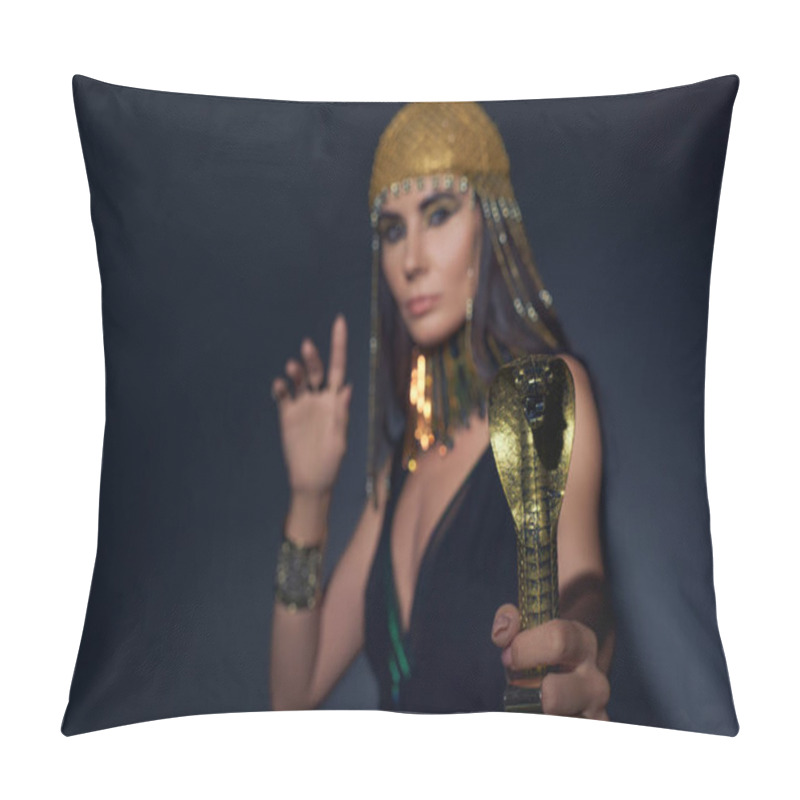 Personality  Blurred Woman In Egyptian Look Holding Crook In Snake Shape While Standing On Blue Background Pillow Covers